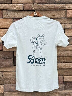 Denim & Flower Ricky Singh Graphic Tee – “Let’s Get This Bread” – Light Blue – S